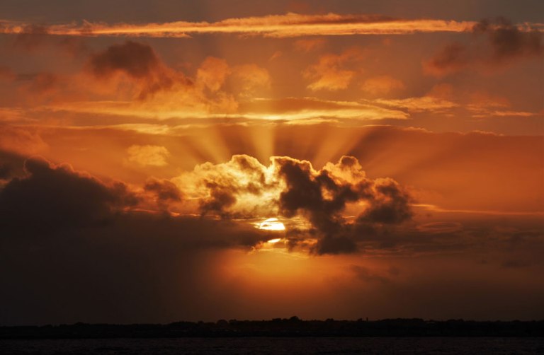 SM Awesome Sun thru Clouds by Alan-Bellis.jpg