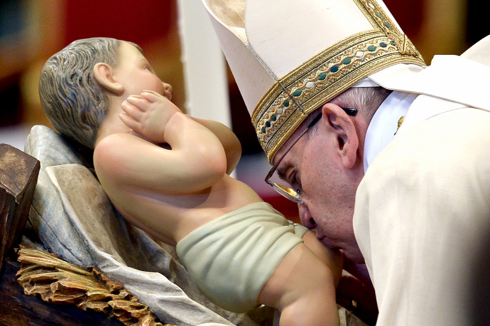 Pope kissing baby Jesus' left knee eeeeeuuuuhhh.jpg