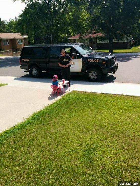 Police supporting local juice stand.jpg